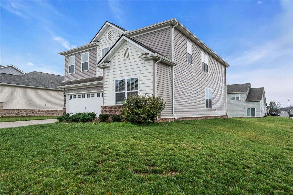 531 Mickelson Way Spring Hill, TN 37174 - Photo 43 of 57 a view of a house with a yard