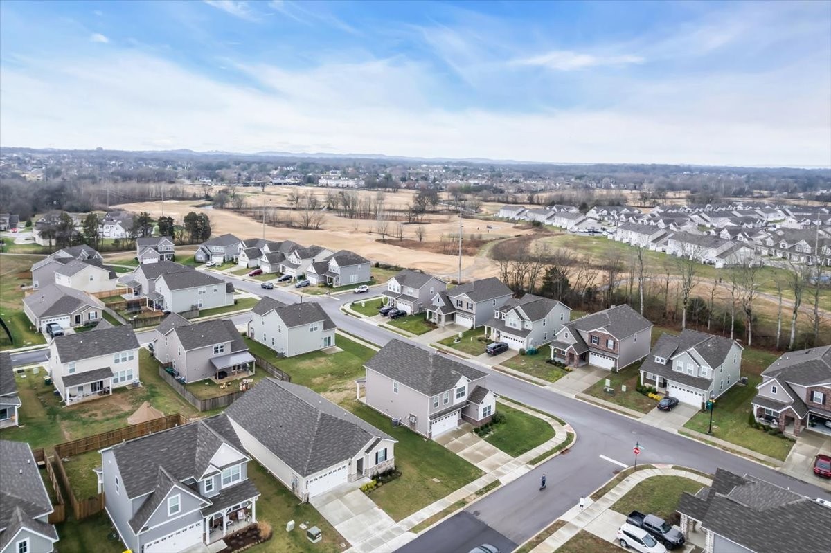 531 Mickelson Way Spring Hill, TN 37174 - Photo 47 of 57 an aerial view of a city with lots of residential buildings