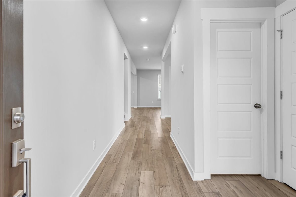 531 Mickelson Way Spring Hill, TN 37174 - Photo 5 of 57 a view of a hallway with wooden floor