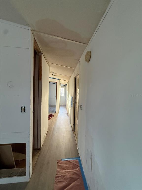 12941 208th Street O'Brien, FL 32071 - Photo 8 of 10 a view of hallway with wooden floor