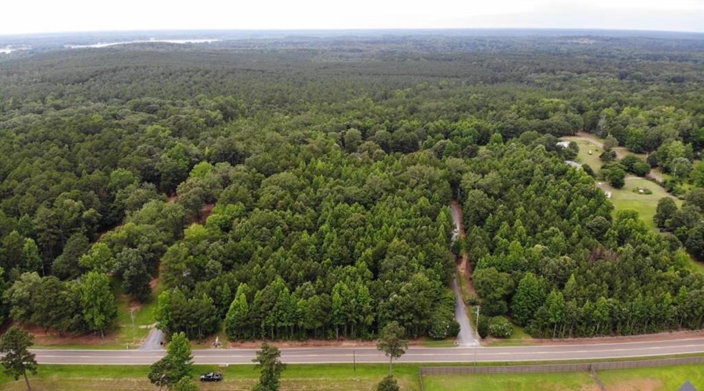 0 Crouch Road, Unit 2 Benton, LA 71006 - Photo 3 of 7 Expansive wooded acreage featuring mature trees and a paved road frontage