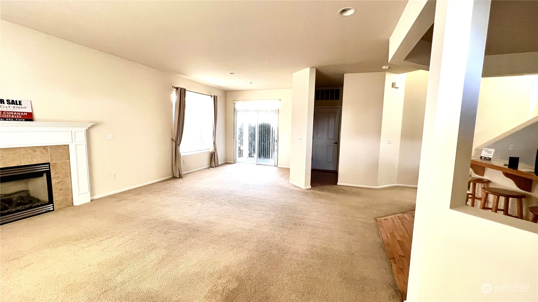 17058 166th Place Southeast Renton, WA 98058 - Photo 3 of 17 a view of a livingroom with a fireplace