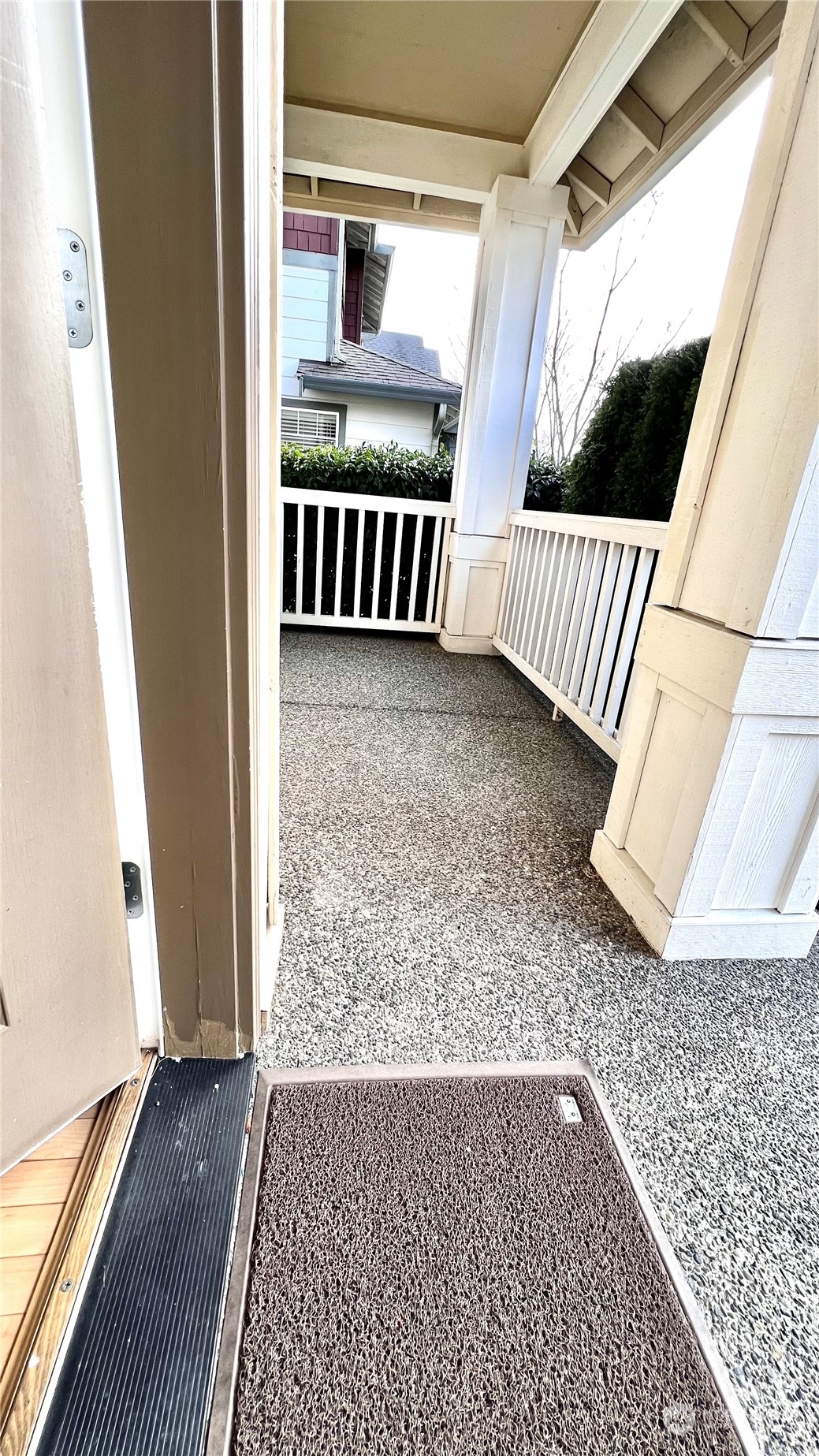 17058 166th Place Southeast Renton, WA 98058 - Photo 4 of 17 a view of a porch with wooden floor