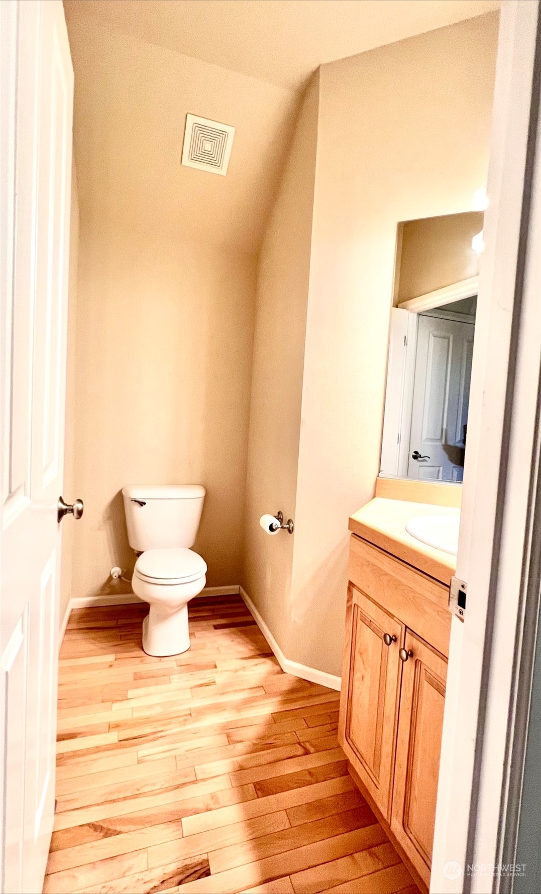 17058 166th Place Southeast Renton, WA 98058 - Photo 8 of 17 a view of a bathroom with sink and mirror