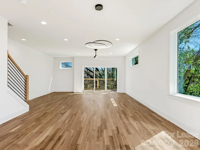 a view of outdoor space and wooden floor