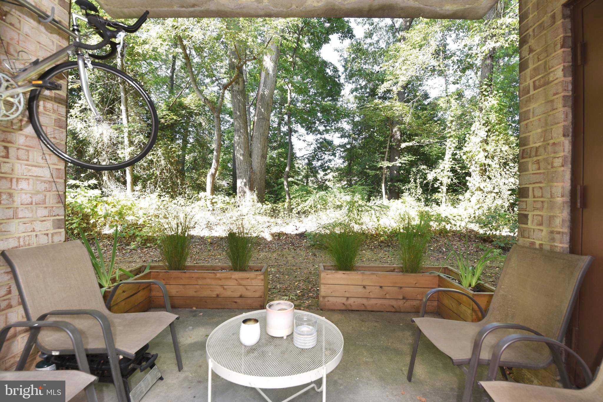 2235 Castle Rock Square, Unit 1B Reston, VA 20191 - Photo 26 of 26 Patio overlooking trees