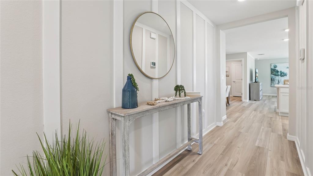 4640 Connection Road Wildwood, FL 34785 - Photo 2 of 30 a view of a bathroom with mirror and door