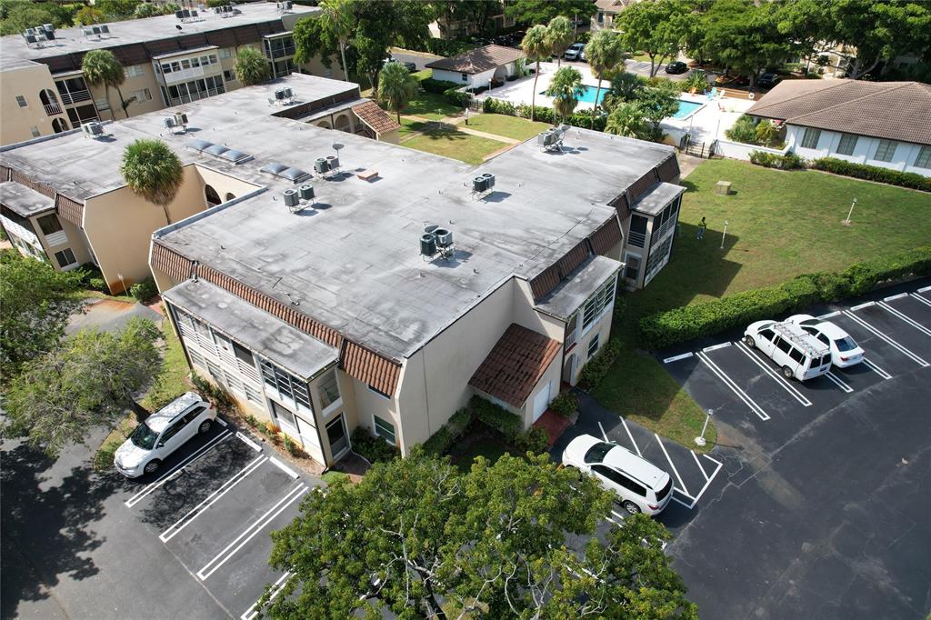 2710 Riverside Drive, Unit 201 Coral Springs, FL 33065 - Photo 3 of 37 an aerial view of a house with yard terrace seating area