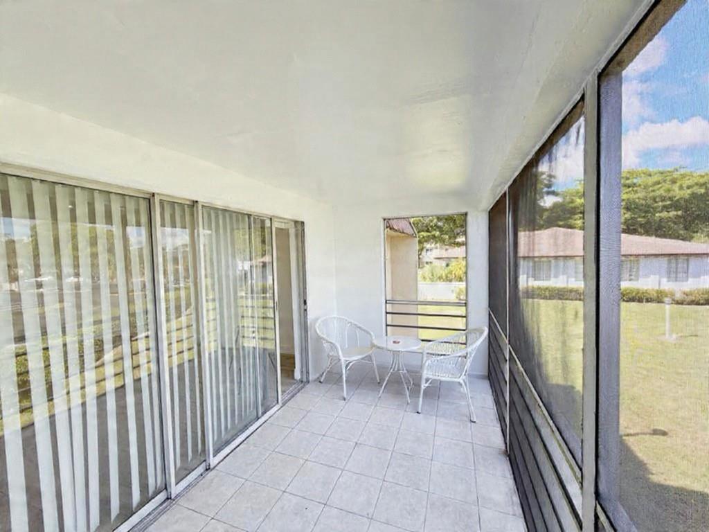 2710 Riverside Drive, Unit 201 Coral Springs, FL 33065 - Photo 33 of 37 a view of a room with a large window