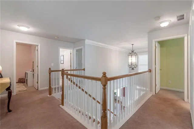 a view of hallway with livingroom