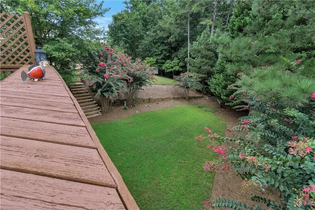 a backyard of a house with lots of green space