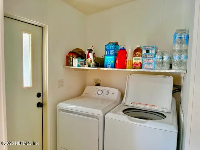 a utility room with dryer and washer