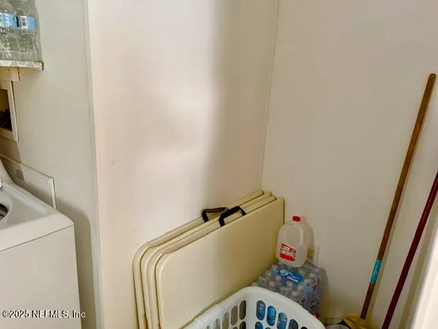 a bathroom with a bathtub and toilet