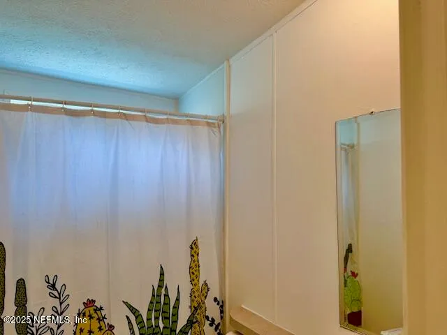 a kitchen with a sink cabinets and window