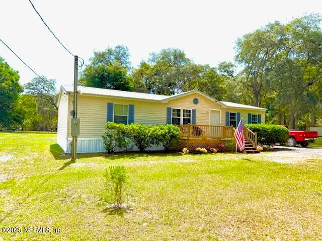 a view of a house with a swimming pool