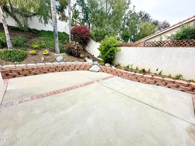a view of a garden with a pathway