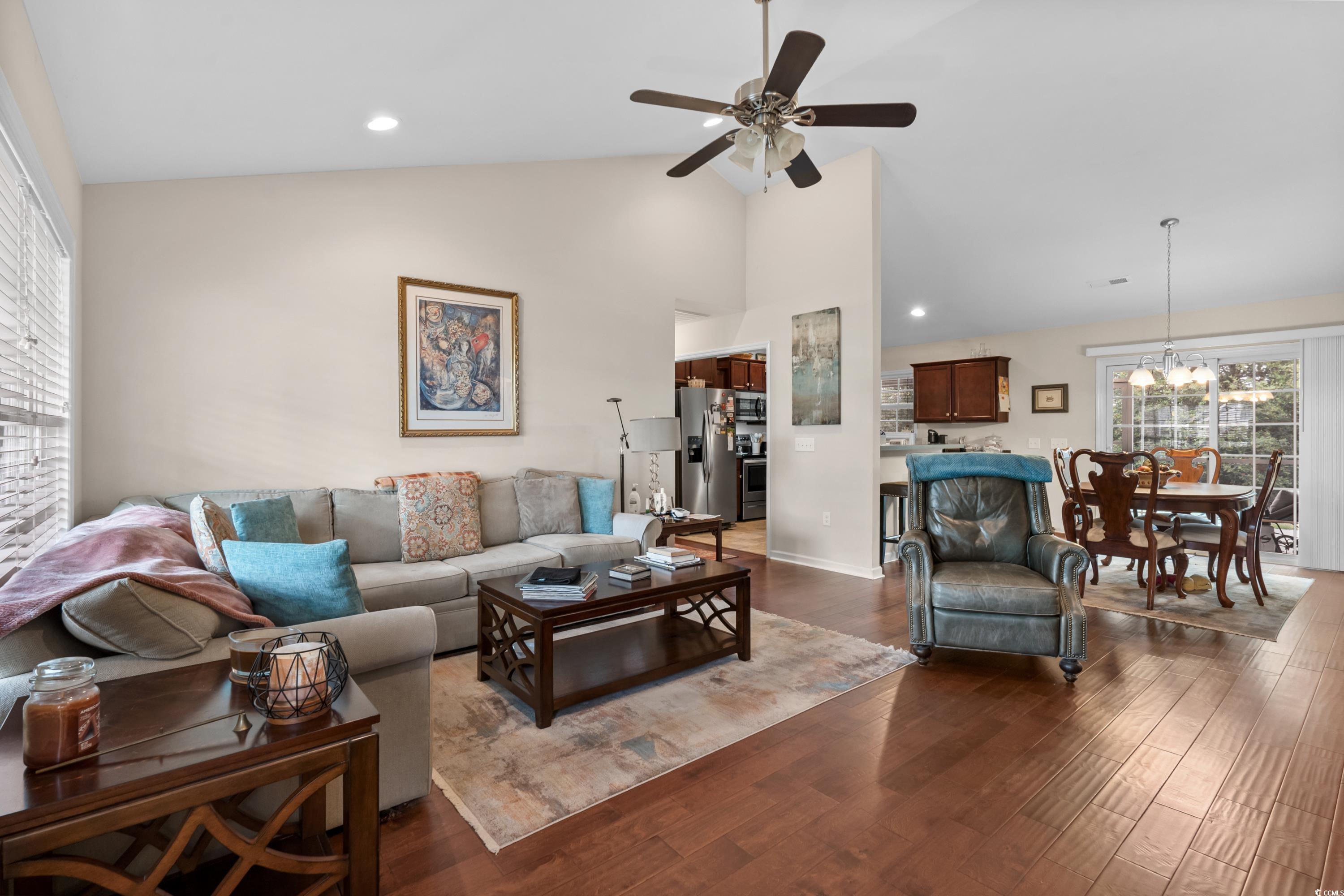 210 Georgia Mae Loop Conway, SC 29527 - Photo 6 of 40 Living area with dark wood-style flooring, high va