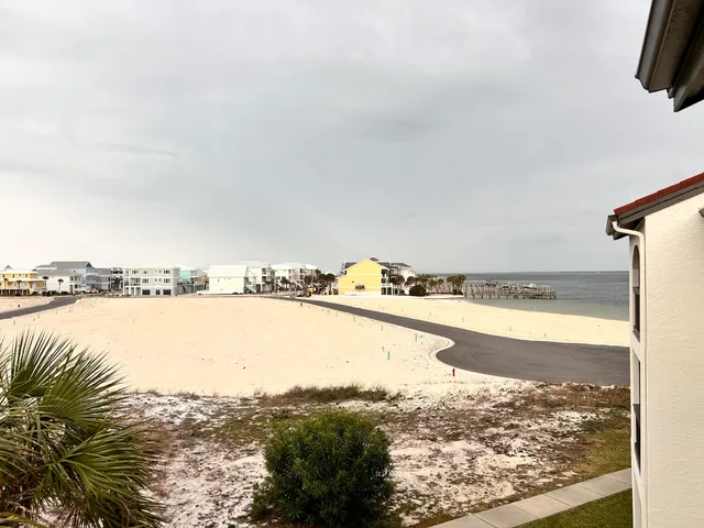 a view of an ocean and city