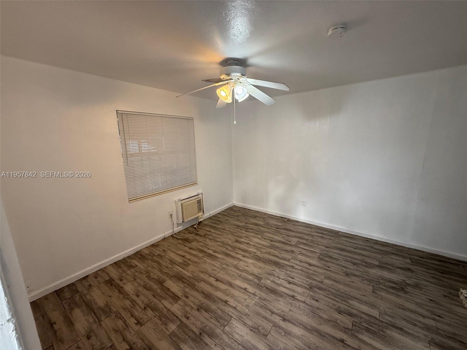 34 Southwest 5th Street, Unit 2 Hallandale Beach, FL 33009 - Photo 11 of 12 wooden floor in an empty room