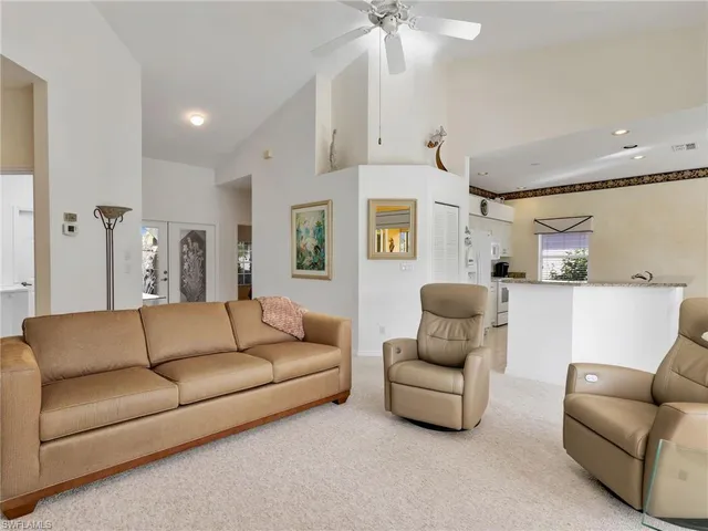 a living room with furniture and a couch