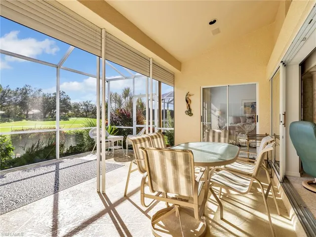 an aerial view of a pool patio swimming pool and outdoor seating