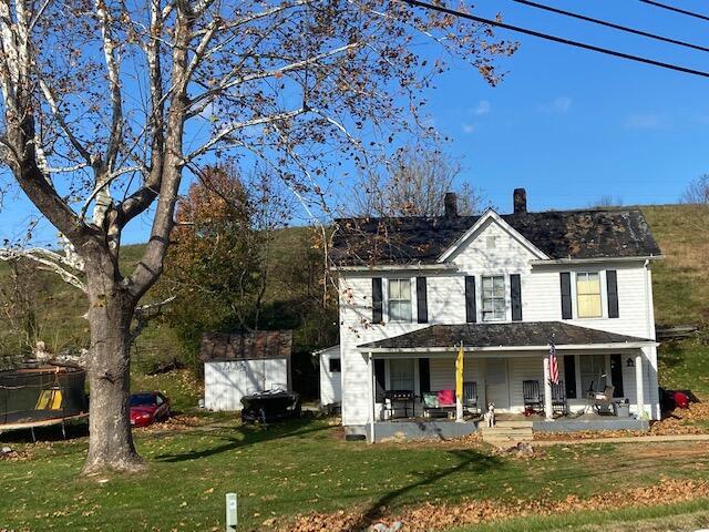 4569 Jordantown Road Vinton, VA 24179 - Photo 4 of 10 a front view of a house with garden