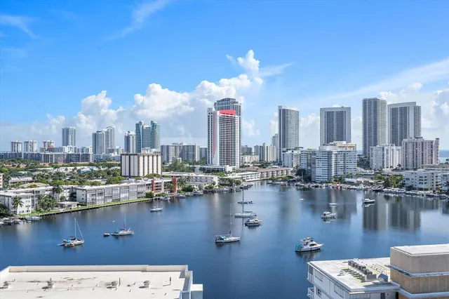 a view of a city with tall buildings