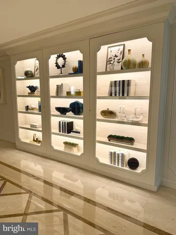 a kitchen with a stove a sink and a refrigerator