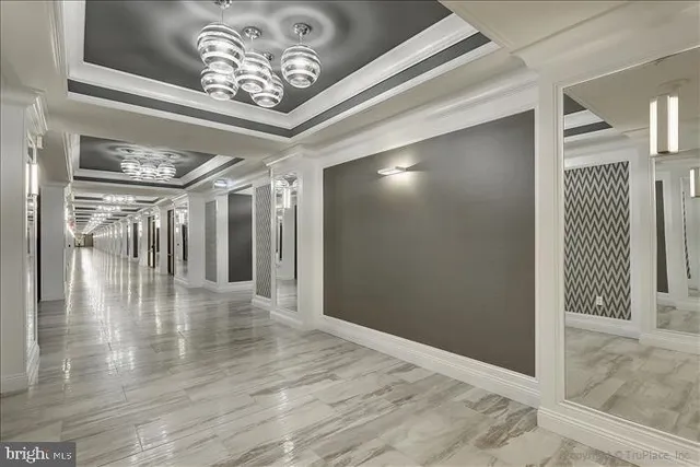 a view of a swimming pool with a yard in back