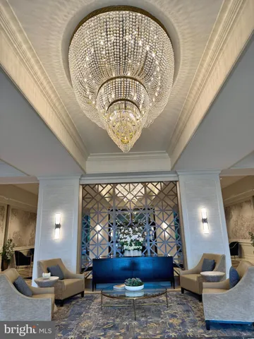 a view of a garden with a bench and trees