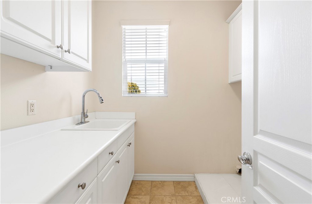 87 Fringe Tree Irvine, CA 92606 - Photo 22 of 24 Laundry Room