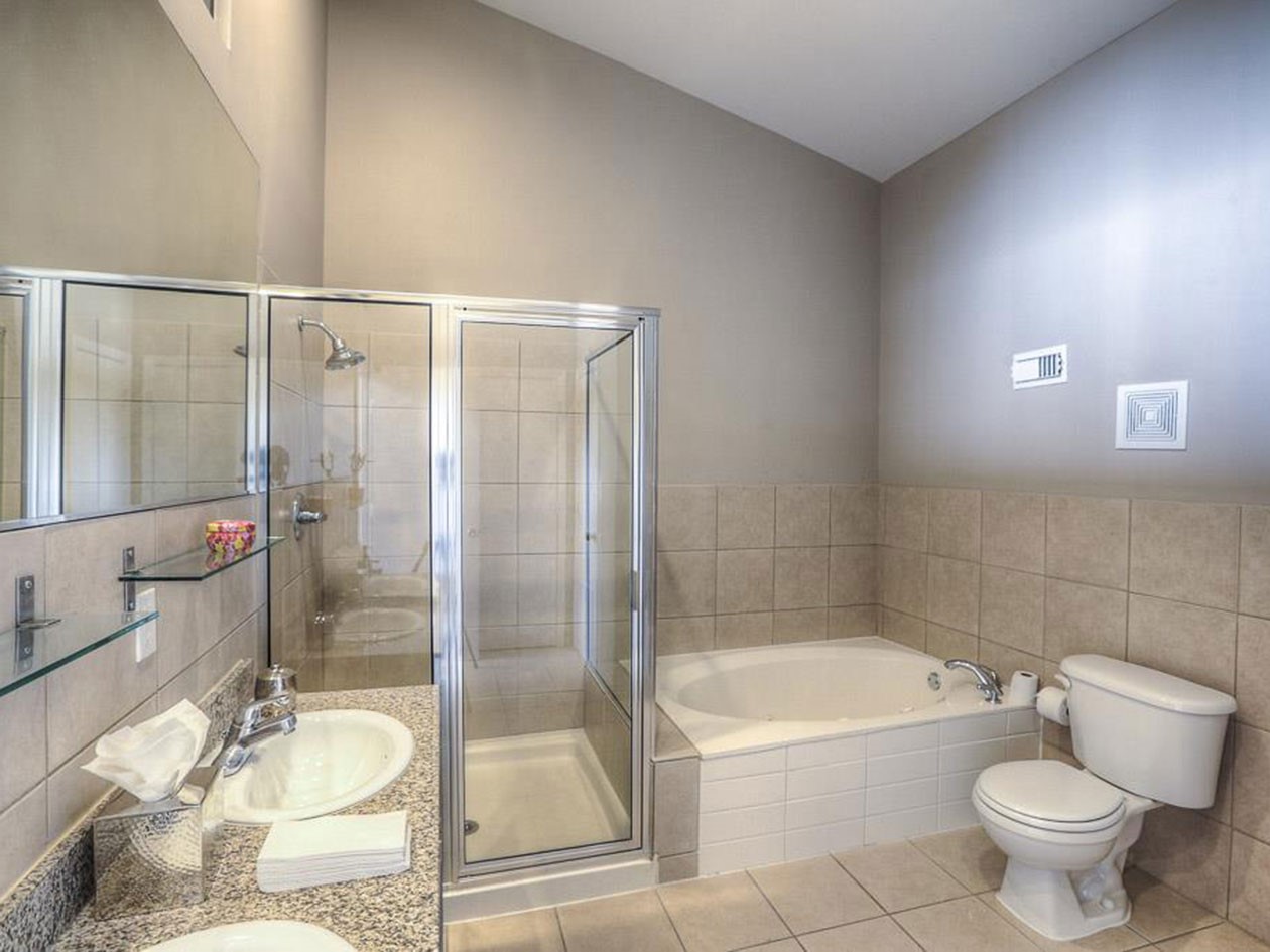 1601 West Webster Street, Unit 11 Houston, TX 77019 - Photo 15 of 26 a bathroom with a sink toilet and shower