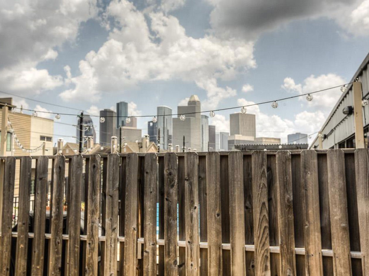 1601 West Webster Street, Unit 11 Houston, TX 77019 - Photo 20 of 26 a view of residential house with fence