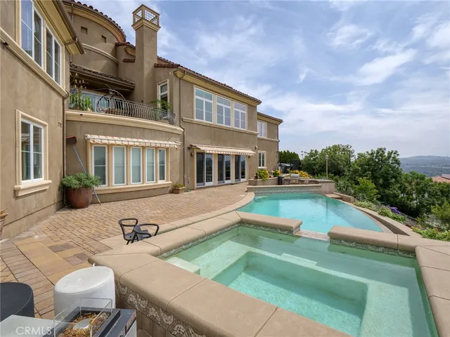 a kitchen with sink refrigerator and stove