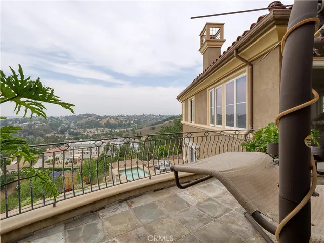 a living room with furniture and white walls