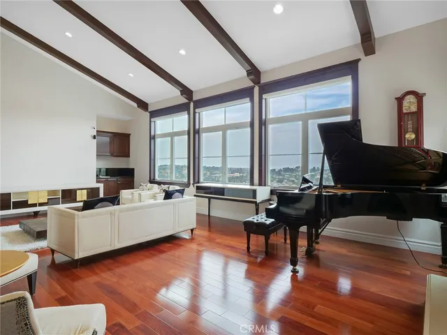 a view of a house with a bench in a patio
