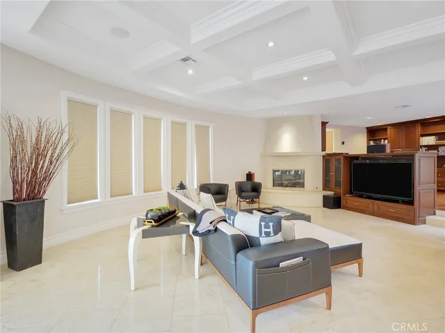 a work room with furniture and a window