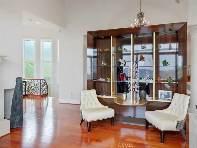 a bedroom with bed and flat screen tv