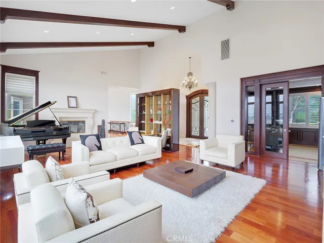 a bed room with a bed and a chair