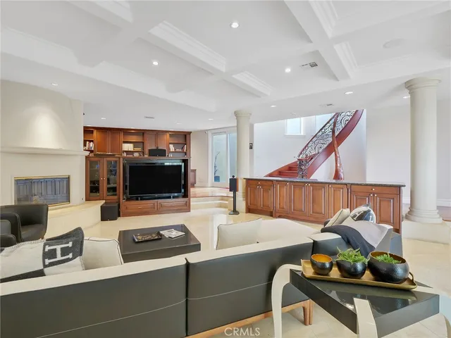 a living room with granite countertop furniture and a window