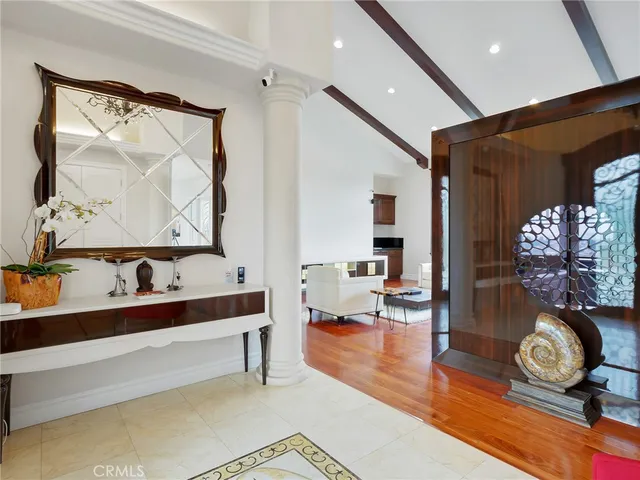 a large living room with a large tub and sink