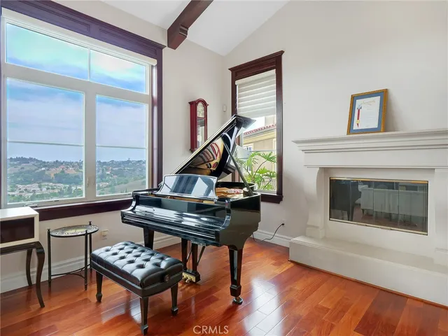 a bathroom with a toilet and a window