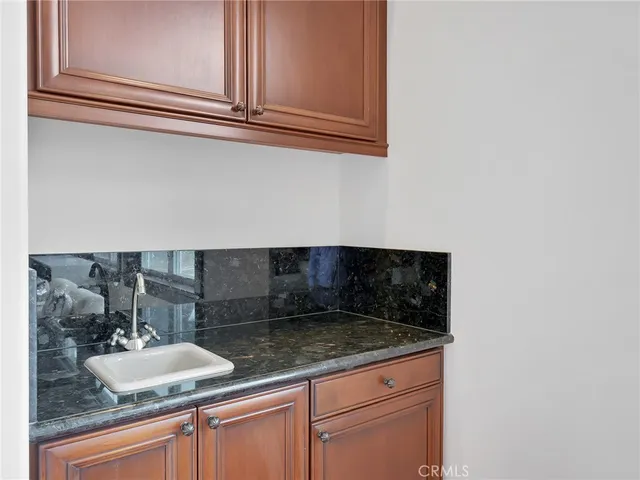 a spacious bedroom with a bed and a closet