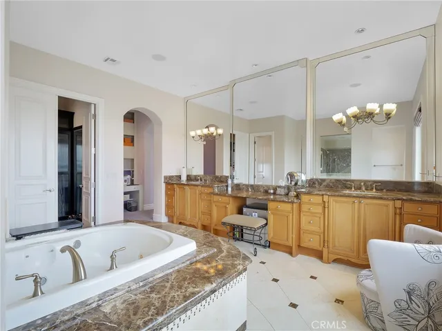 a bedroom with bed and a table