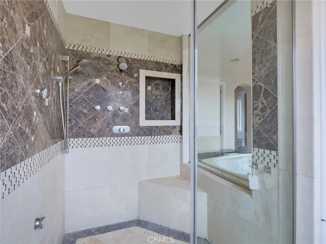 a bathroom with a sink vanity and a mirror
