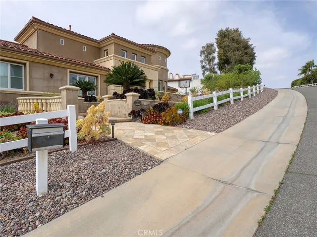 a view of swimming pool with outdoor seating and yard in back
