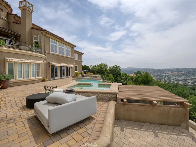 a view of a house with a swimming pool