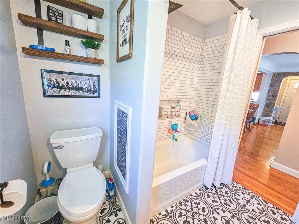 4270 Mellinger Road Canfield, OH 44406 - Photo 29 of 49 Full bath with shower / tub combo and tile patterned floors