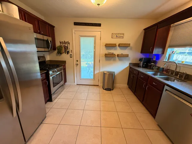 a kitchen with a cabinets and a stove