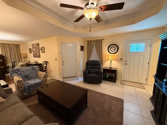 a living room with furniture and a couch
